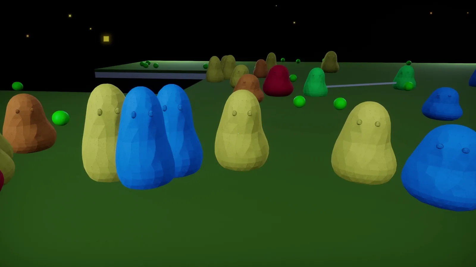 Colourful round creatures gathering on a green field